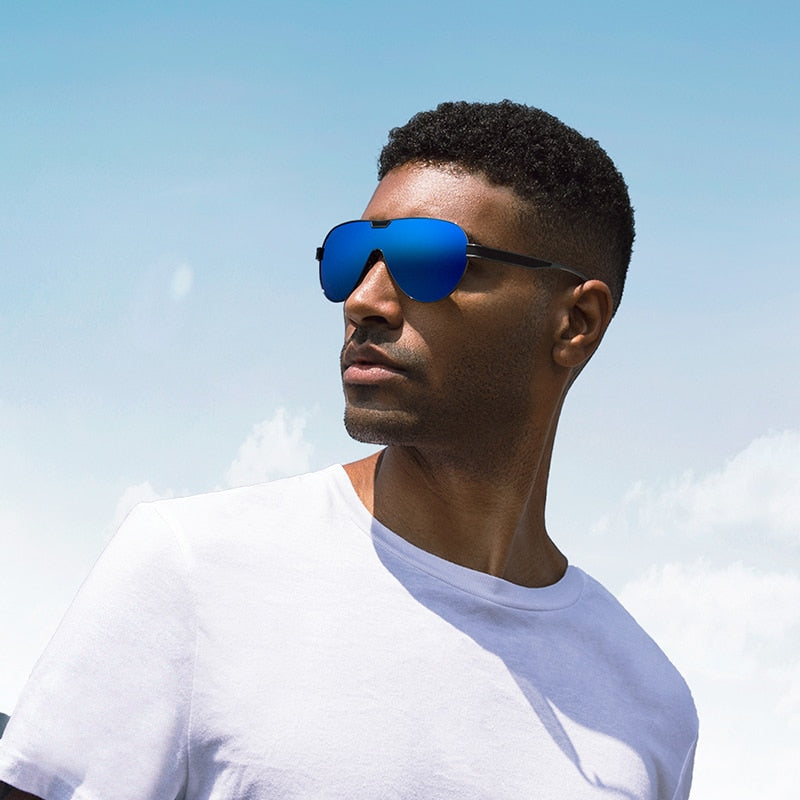 Model wearing blue mirror lens Barcur Polarised Single-Lens sunglasses