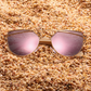 Barcur Bamboo Cat Eye sunglasses with pebble background