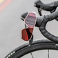 RockBros Polarised Cycling glasses hanging on a bicycle handlebar